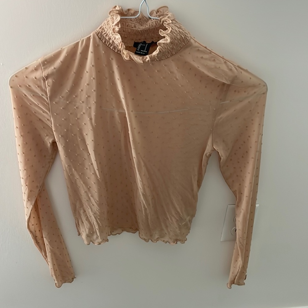 Sheer polka dot mock neck top